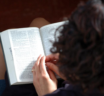 Woman Reading a Bible Passage